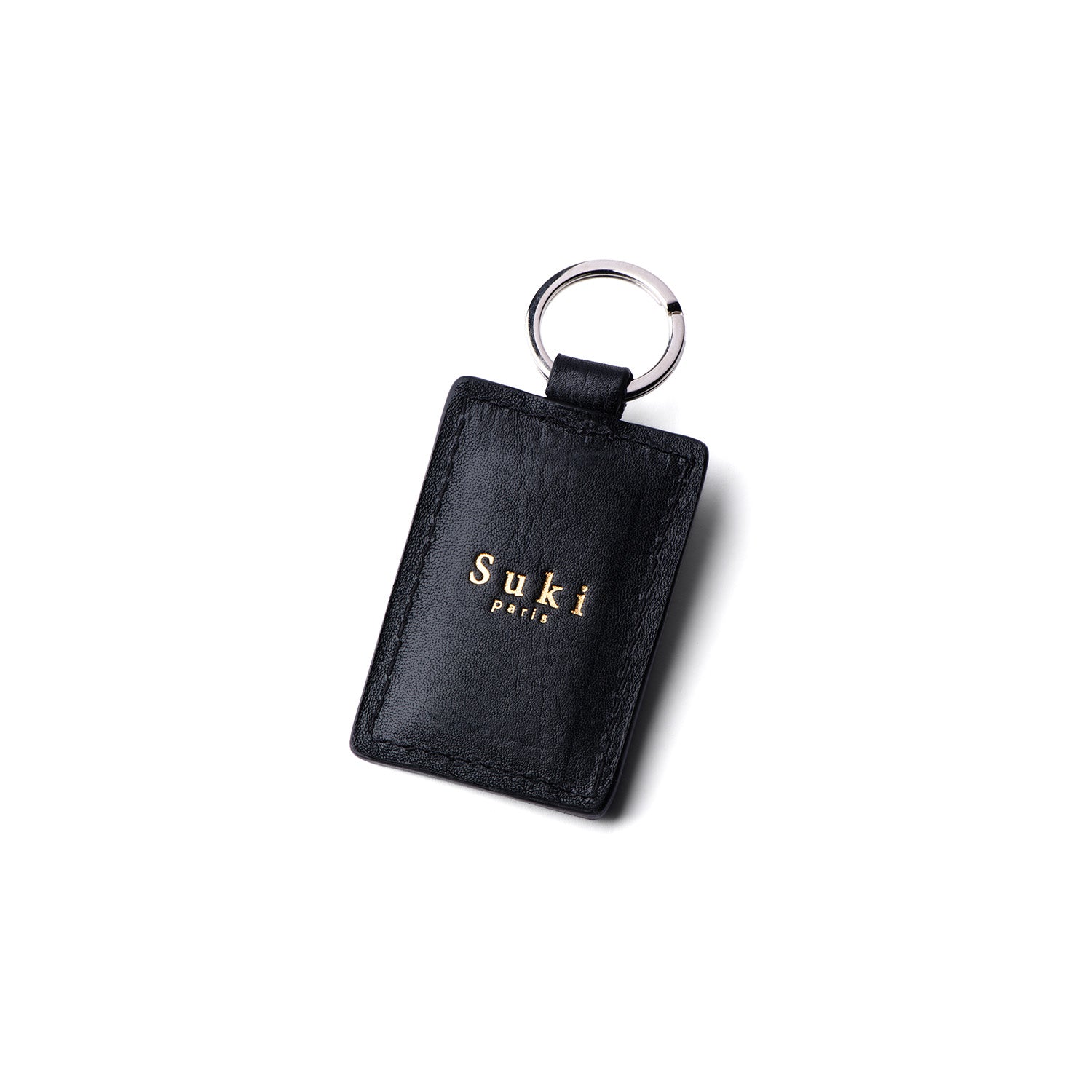 Atelier de maroquinerie à Paris. Porte-clé en cuir made in France. Maroquinerie française pour homme et femme. Idée cadeau, accessoire personnalisable. Proposition d'atelier découverte maroquinerie. Boutique de maroquinerie Paris 17.