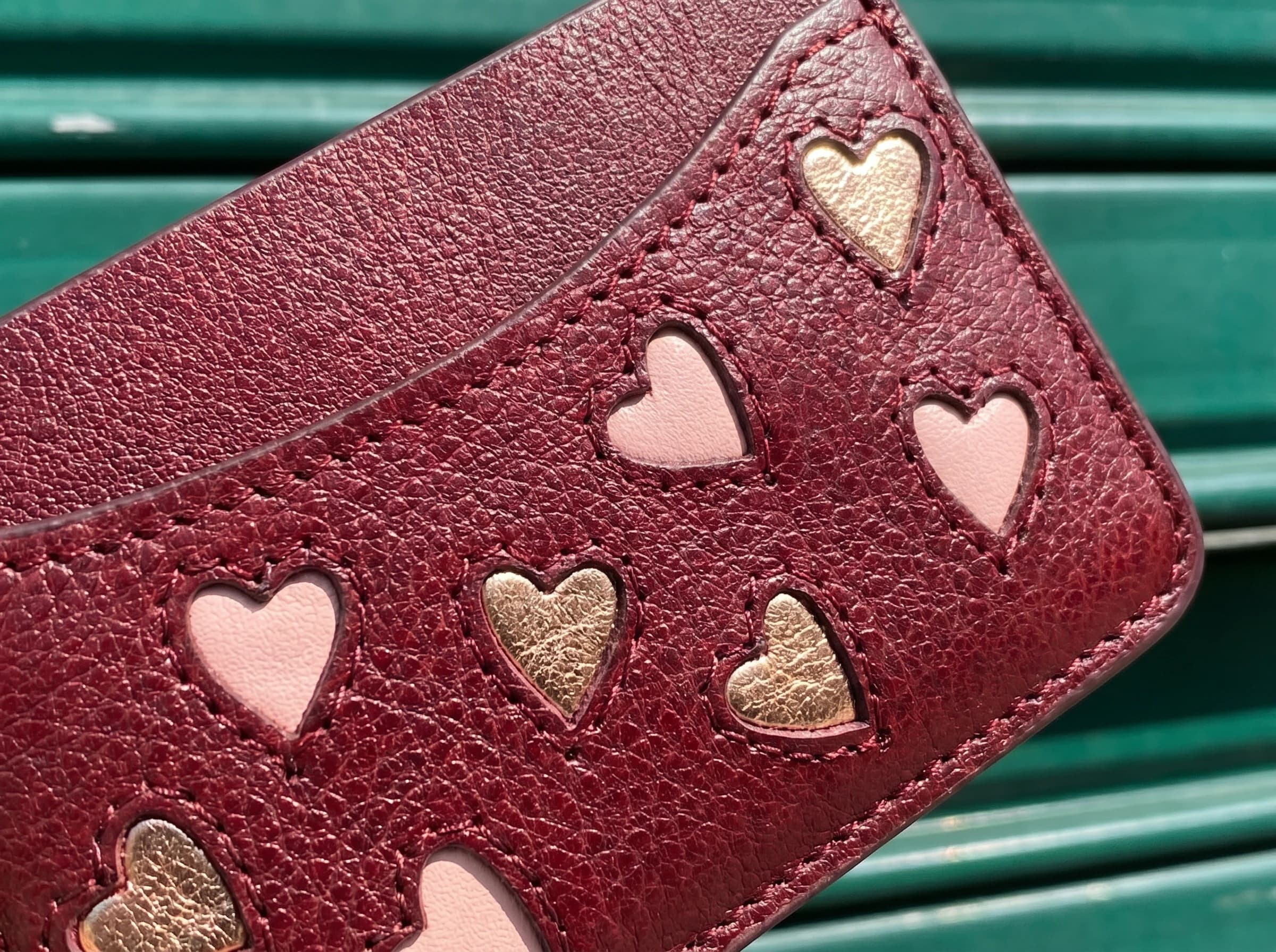 Amour card holder in the maker's hands — Suki Paris atelier