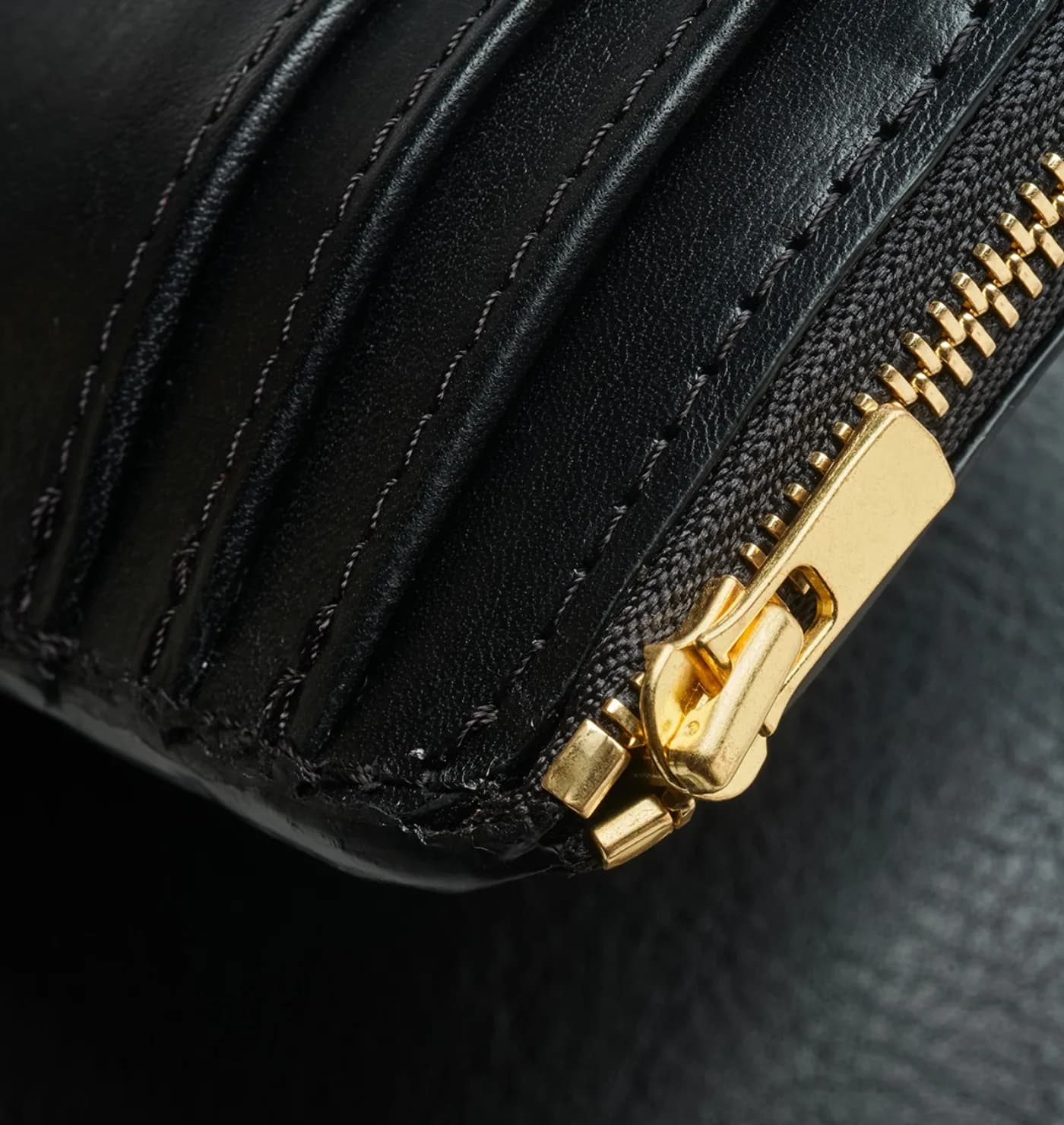 Achille black leather purse — gold zip closure detail, Suki Paris atelier