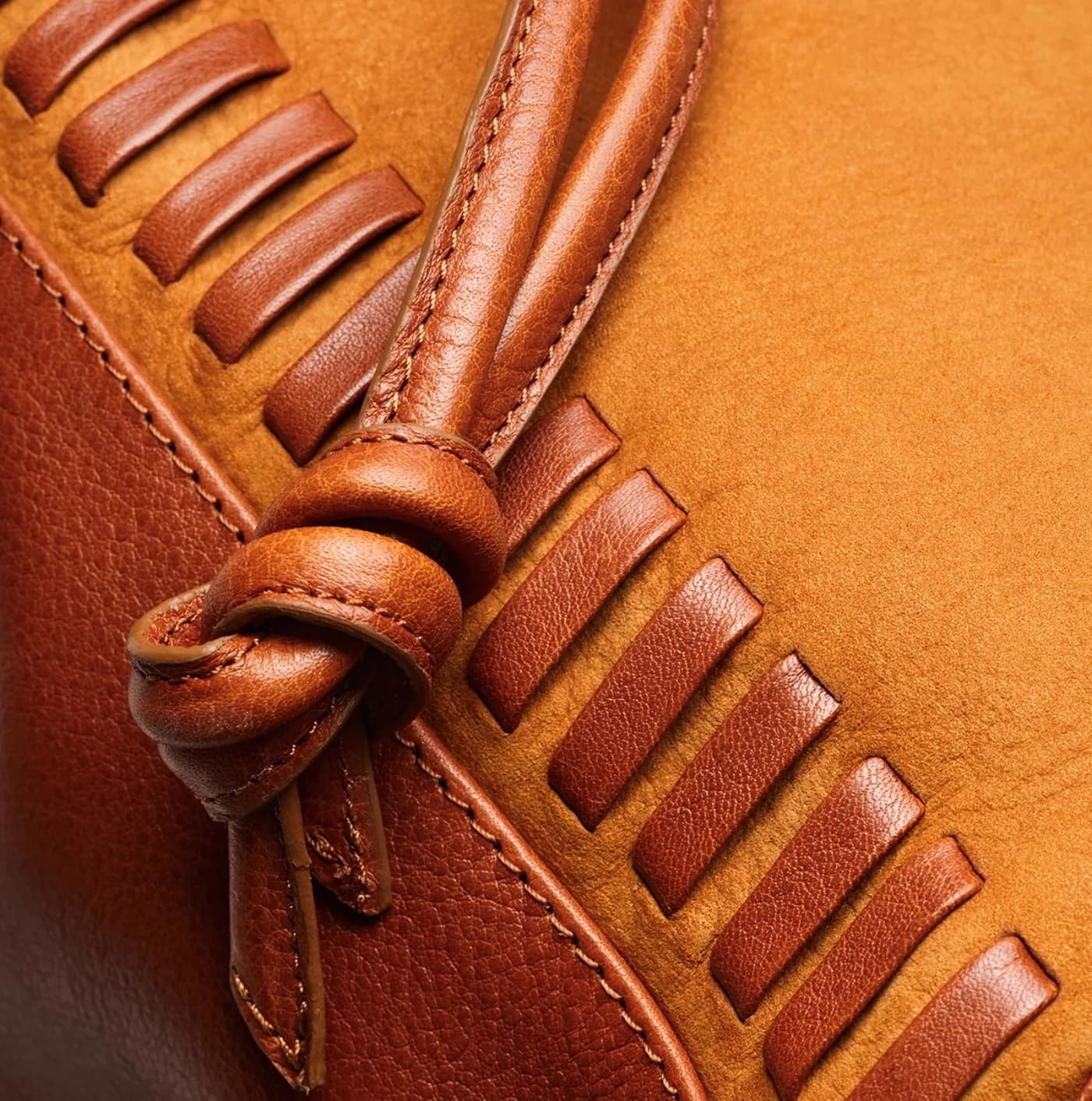 Altai camel bucket bag — knotted leather-cord weave detail, Suki Paris atelier